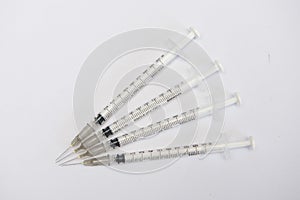 Medical syringe on white background