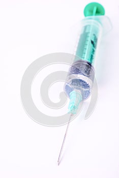 Medical syringe on a white background. macro photo