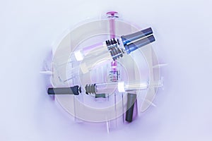 Medical Syringes inside a Sharps Collector photo
