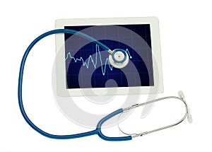 Medical tablet with ECG and blue stethoscope