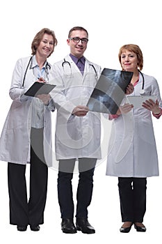 Medical team discussing diagnosis of x-ray image