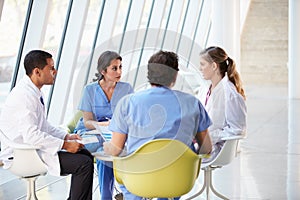 Medical Team Meeting Around Table