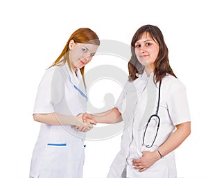 Medical team - a nurse and a doctor handshake