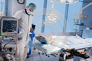 Medical Team Performing Surgical Operation in Bright Modern Operating Room