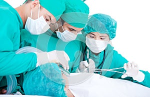 Medical team using surgery equipment
