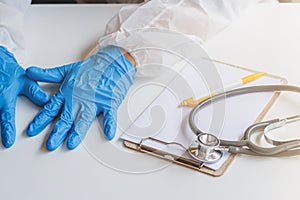 The medical team wore a coronavirus protective suit and rubber gloves to examine the coronavirus covid-19 and research for a