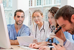 Medical team working at the hospital all together