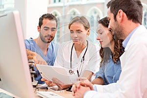 Medical team working at the hospital all together