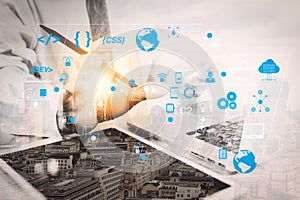 Medical technology concept. Doctor hand working with modern digital tablet and laptop computer with medical chart interface, Sun