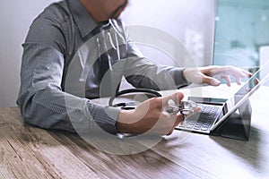 Medical technology concept. Doctor hand working with modern digital tablet dock screen computer with medical chart interface, Sun