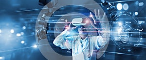 Medical technology. Health care, Medicine doctor using virtual reality headset with robots to research and testing result of