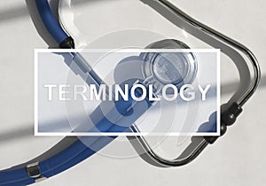 Medical terminology text on stethoscope. Medicine glossary concept photo