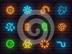 Medical theme colorful neon icons set of bacteria virus cell on a brick wall background. collection of signs symbols icons red blu