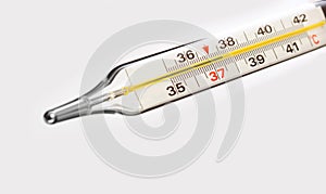 Medical thermometer indicating 37.5