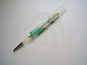 Medical thermometer on a white background.