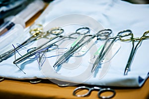 Medical threads and needles in the operating room.