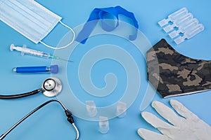 Medical tools and materials on blue background photo