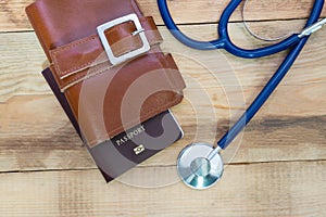 Medical tourism concept. Stethoscope with passport