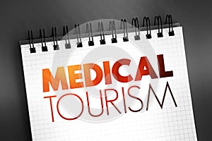 Medical Tourism text on notepad, health concept background