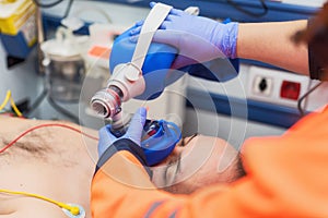Medical urgency in the ambulance. Cardiopulmonary resuscitation using hand valve mask bag
