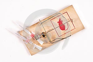 Medical venflon placed in a mousetrap. Medical accessories as a trap for patients