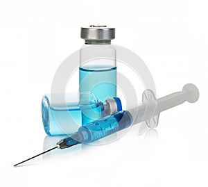Medical vials with blue medication solution.