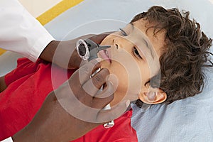 Medical visit - young boy- examination of the nose