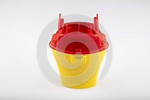 Medical waste bin pocket size 0,4 liter. Yellow biohazard medical contaminated clinical waste container isolated on white