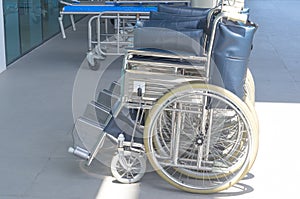 Medical wheelchairs and stretchers at hospital for handicap and patients