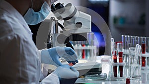 Medical worker making blood test for detection of antibodies and infections