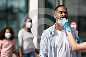Medical Worker Making Covid-19 PCR Test For Black Man