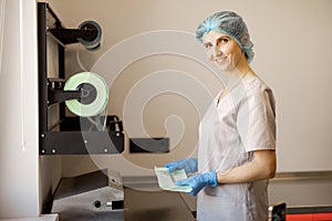 Medical worker packs sterile medical instruments