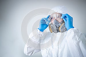 Medical worker wearing biohazard protective suit