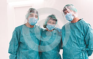 Medical workers inside hospital corridor during coronavirus pandemic outbreak - Doctor and nurse at work on Covid-19 crisis period