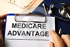 Medicare advantage in a clipboard.