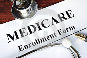 Medicare enrollment form written on a paper. photo