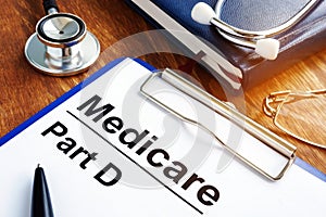 Medicare Part D documents with clipboard photo