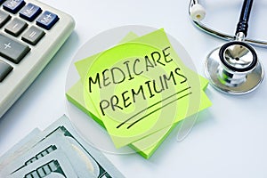 Medicare premiums written on the sticker and stethoscope.