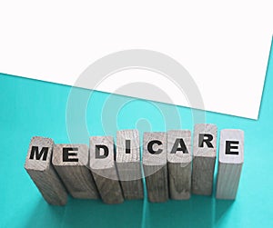 MEDICARE word made with building blocks. Medicine healthcare concept
