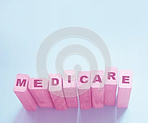 MEDICARE word made with building blocks. Medicine healthcare concept