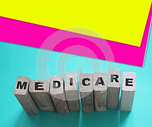 MEDICARE word made with building blocks. Medicine healthcare concept