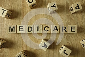 Medicare word from wooden blocks photo