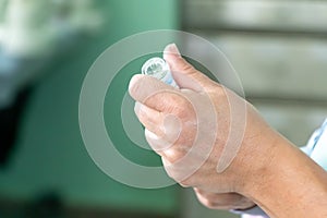 Medication being prepared by a nurse