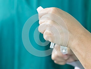 Medication being prepared by a nurse