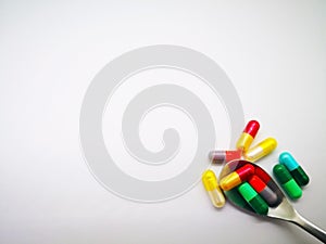 Medication and healthcare concept. Many colorful capsules of med