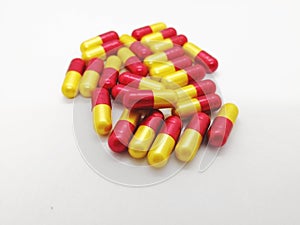 Medication and healthcare concept. Many green-blue capsules of A