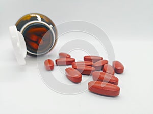 Medication and healthcare concept. Many oval brown tablets of mu