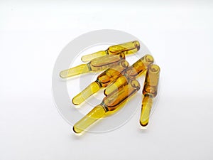 Medication and healthcare concept. Many transparent brown ampule
