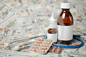 Medications on background of money. Ð¡ost of treatment and medical insurance