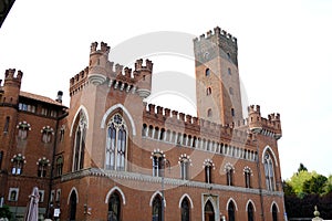 Medici del Vascello neo-Gothic palace in Asti. Building with red brick walls and battlements located in the historic center, in photo